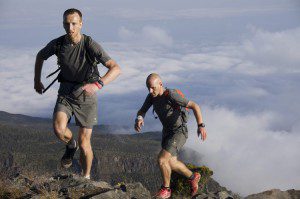 Two Scotsmen have written themselves into the record books by scaling their country's 10 highest peaks in a day