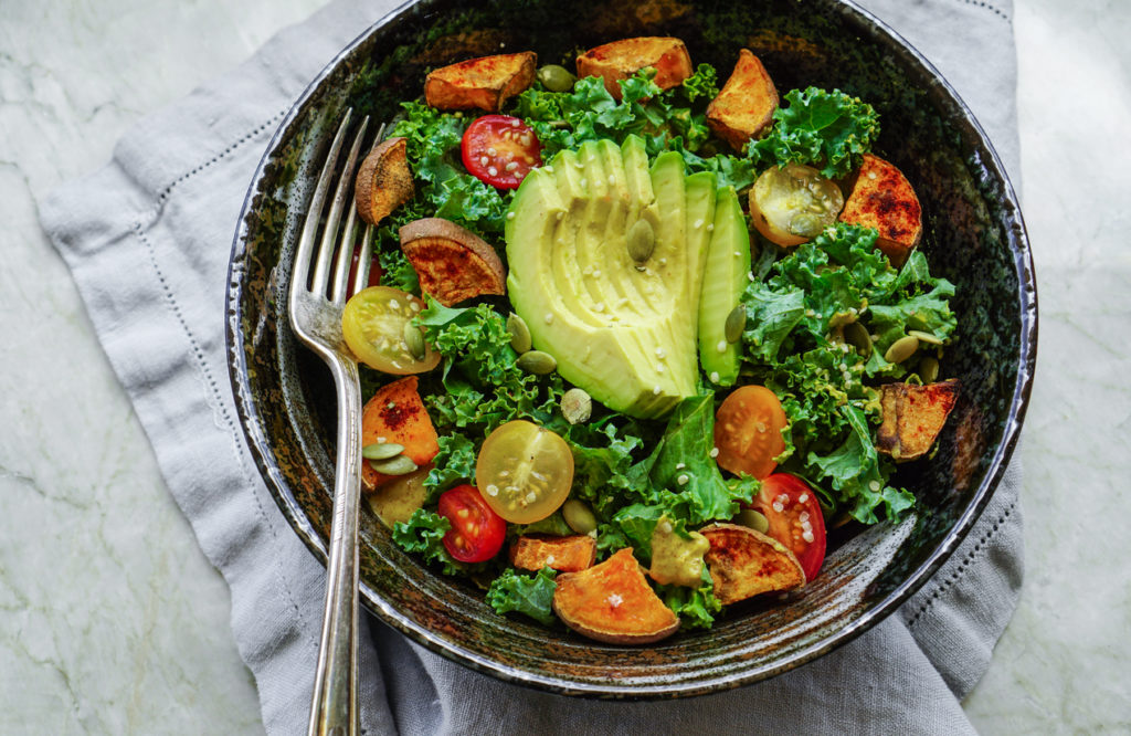 Kale, roasted yams and avocado salad