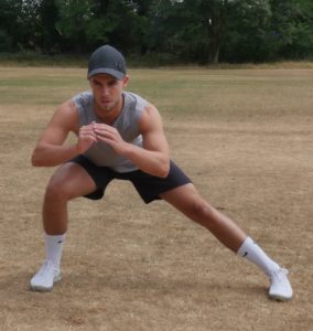 Jack Healy demonstrating the first of the mobilisation exercises, the alternating side lunge 