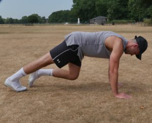 Jack showing the final mobilisation exercise, the ankle and calf mobilisation stretch 